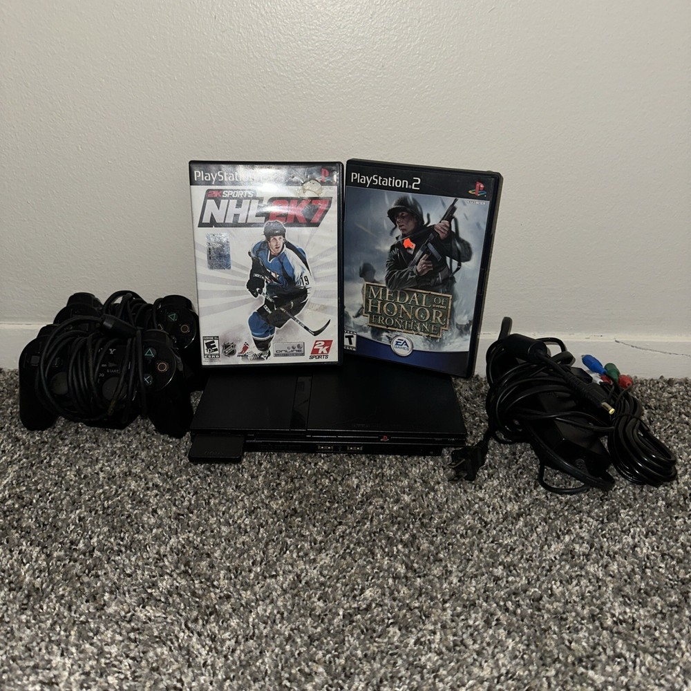 PS2 Slim Console With 2 Games And Dual Shock Remote! 8mg Memory Cards