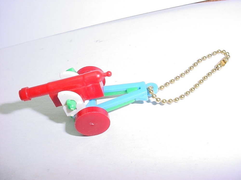 vintage take apart plastic Cannon Keychain Puzzle