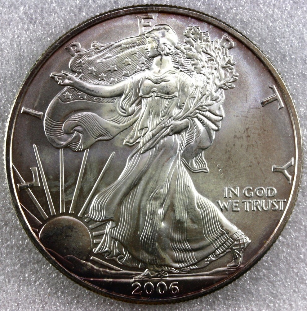2006 American Silver Eagle - Brilliant Uncirculated END ROLL TONED us114