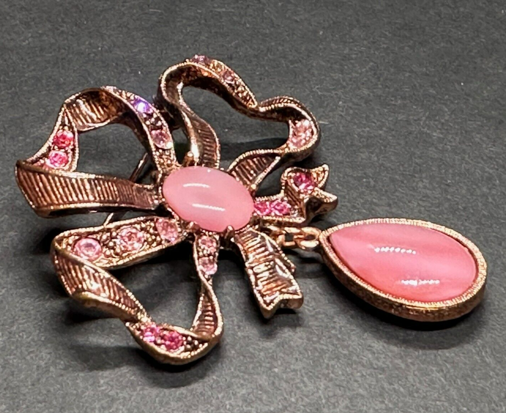 1928 Brand Pink Rhinestone Copper tone Bow Brooch Teardrop Cabochon Dangle Pave