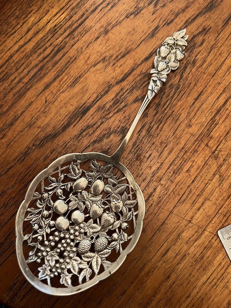 Large Ornate Antique Dutch Sterling berry fruit pattern pierced serving spoon