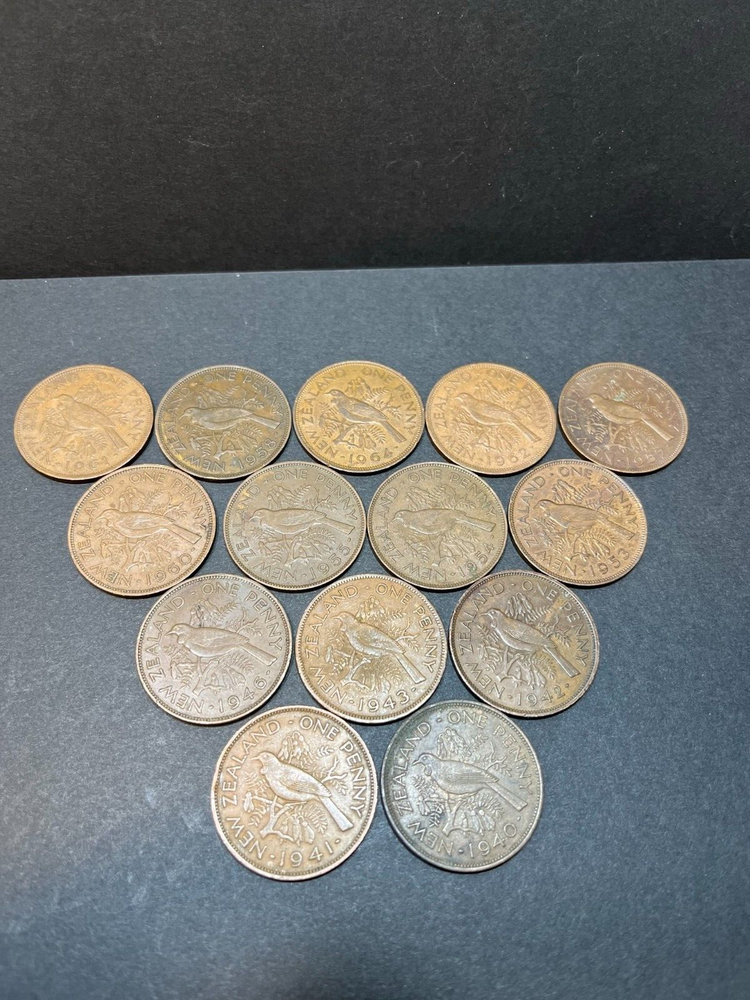 Lot of 14 New Zealand 1 Penny coins (all different dates from 1940-1964)