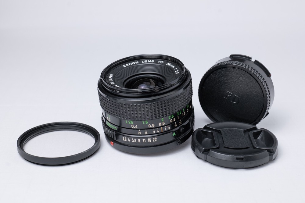 Canon FD 28mm F2.8 Wide Angle Lens FD Mount , Front and Back Caps UV Filter